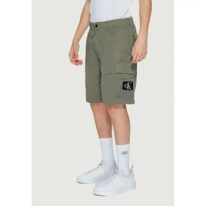 Olive green cargo shorts with CK logo patch from Calvin Klein Jeans Men’s collection