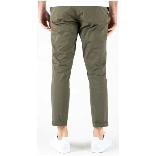 Olive green chino pants with rolled cuffs over white sneakers Lyle & Scott Men Trousers