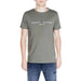 Olive green Tommy Hilfiger men’s t-shirt featuring white logo text design