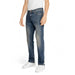 Blue denim jeans worn with a white shirt and sneakers from Gas Men Jeans collection