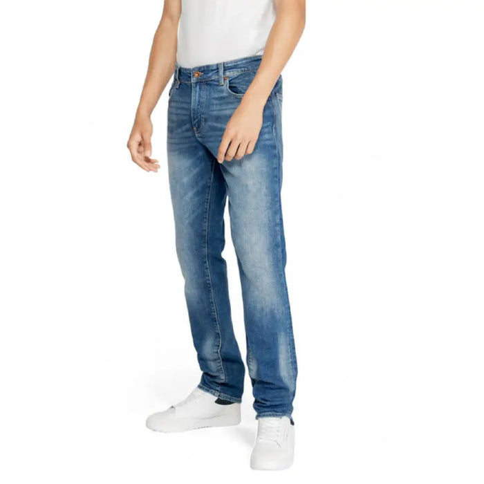 Pair of blue denim jeans worn by a person in Gas Men Jeans fashion