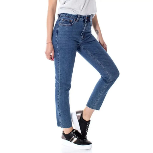 Only Women Jeans: Blue denim, styled with a white top and black sneakers