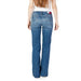 Pair of blue Tommy Hilfiger jeans with logo on waistband, ideal for women