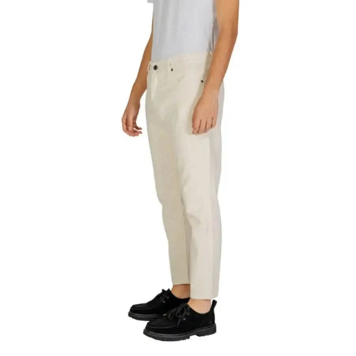 Cream-colored slim-fit Gianni Lupo men trousers displayed elegantly