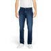 Dark blue Gas Men Jeans styled with white sneakers for a casual look