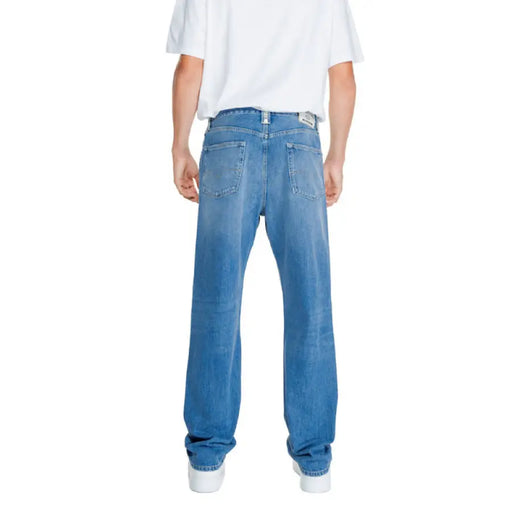 Light blue denim jeans from the back, featuring Replay Men Jeans design