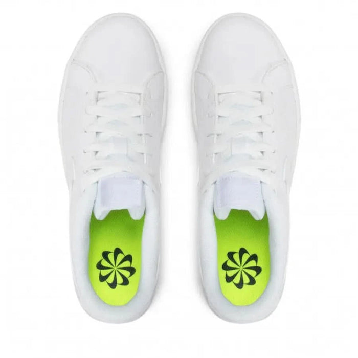 Nike Men Sneakers featuring white sneakers with green insoles and black floral design