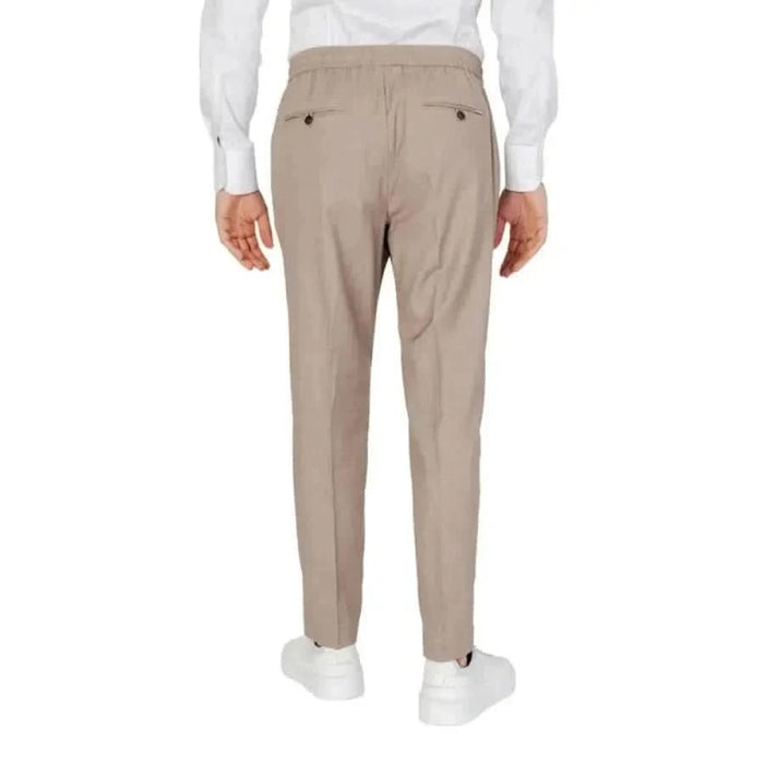 Man wearing Antony Morato Men Trousers in beige color