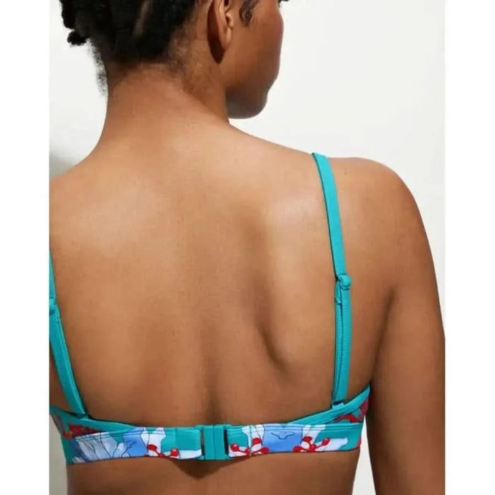 Back view of a person in a turquoise bra with floral band from Desigual Women Beachwear