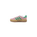 Pink Adidas Women Leather Sneakers featuring green stripes for a stylish look