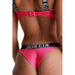 Pink Calvin Klein thong underwear with black elastic waistband for women beachwear