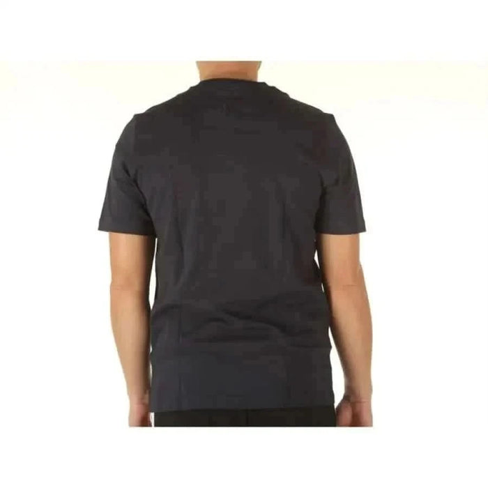 Adidas Men T-Shirt Plain black short-sleeved worn by a person