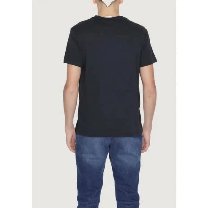 Plain black t-shirt by Emporio Armani worn by a model