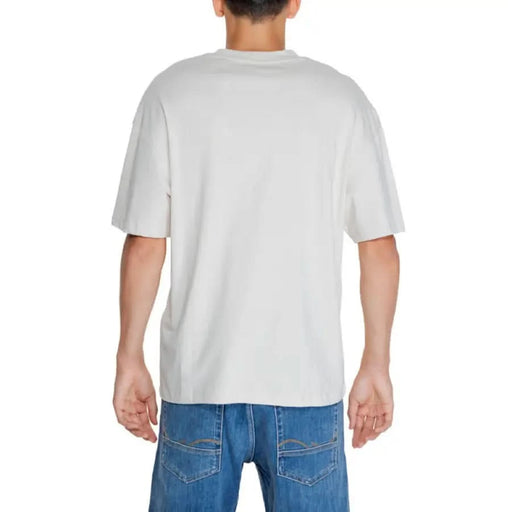 Plain white t-shirt paired with blue jeans by Jack & Jones - Jack & Jones Men T-Shirt