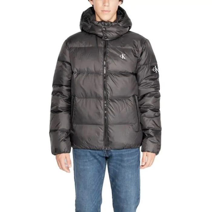 Puffy black winter jacket with hood and zipper from Calvin Klein Men Jacket collection