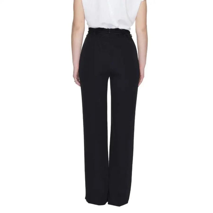 Sandro Ferrone women trousers featuring urban style clothing on the row black person