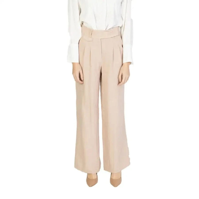 Vero Moda women wearing Vero Moda wide leg silk trousers