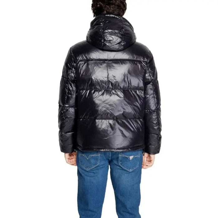 Shiny black puffer jacket worn with blue jeans from Armani Exchange Men Jacket