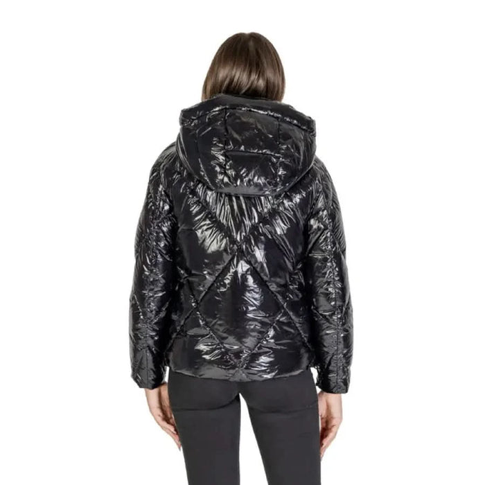 Shiny black quilted puffer jacket with hood displayed from the back by Blauer