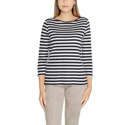 Striped black and white long-sleeved top worn by a woman in Street One T-Shirt