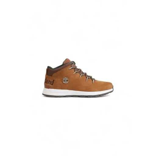 Tan leather ankle boot with dark laces featuring Timberland logo for men sneakers