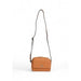 Tan leather crossbody bag with long strap and metal logo emblem by Calvin Klein