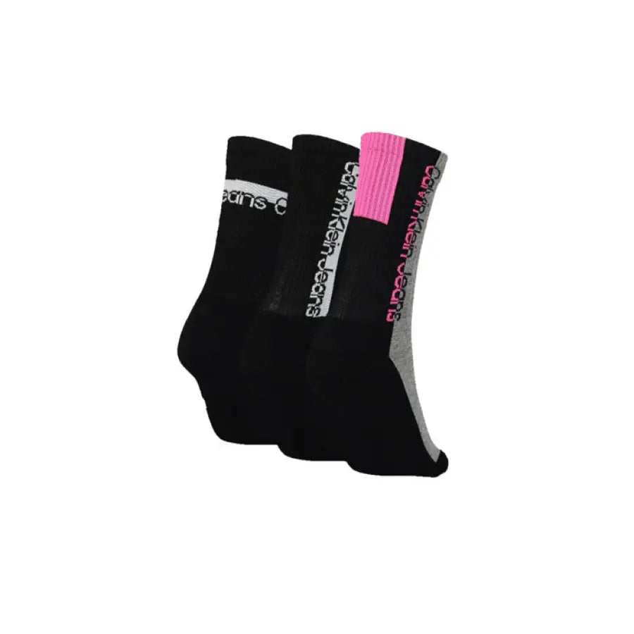 Black Calvin Klein athletic socks with white, pink accents, and branded design