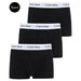 Three black Calvin Klein boxer briefs with white elastic waistbands displayed together