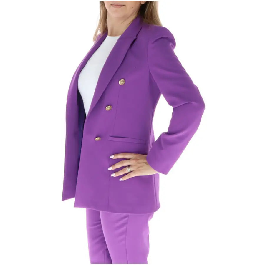 Vibrant purple blazer with gold buttons worn over a white top from Sol Wears Women Blazer