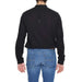 Back view of a model in a black Antony Morato long-sleeved shirt and blue jeans