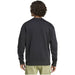 Back view of person in dark gray Adidas sweatshirt with curly hair