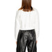 Back view of a person in white sweater and black leather pants from Icon Women Sweatshirts