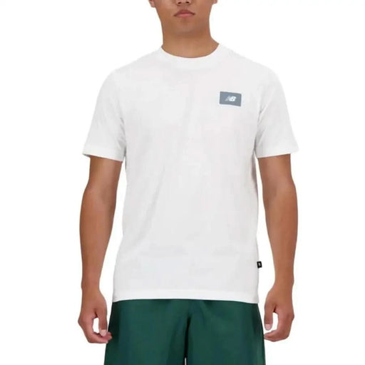 White New Balance Men T-Shirt with a small logo on the chest - Shop Now