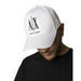 White Armani Exchange cap with AX logo, paired with a black shirt