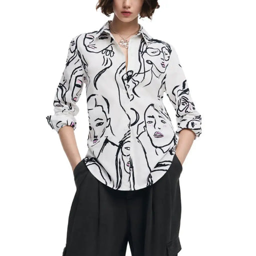 White button-up shirt with black face line drawings by Desigual for women