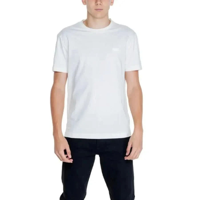 Calvin Klein Men T-Shirt in white, crew neck style, worn by a model