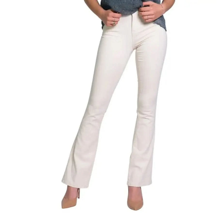 White flared trousers paired with beige high heels in Only - Only Women Jeans collection