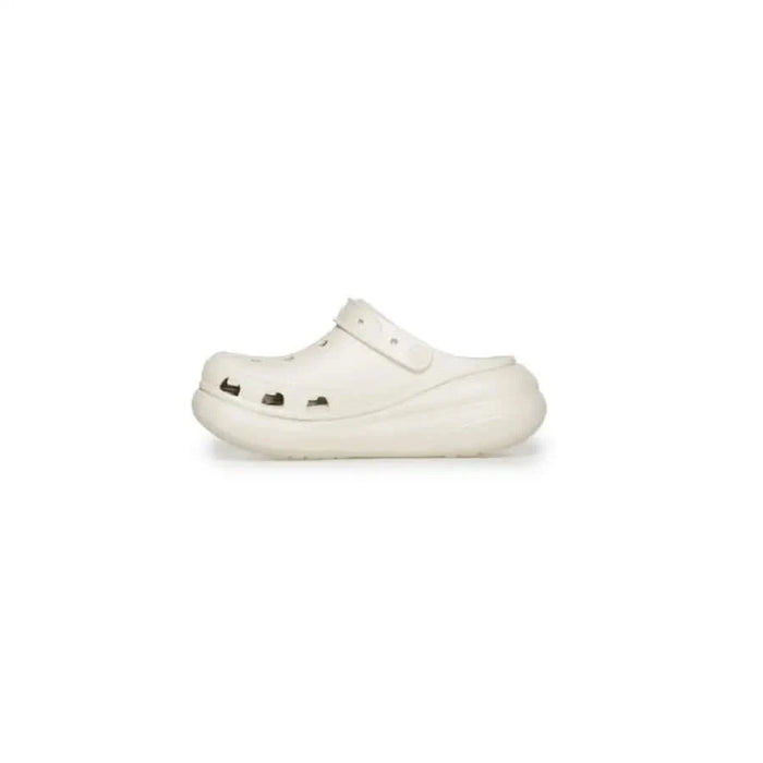 White foam clog-style Crocs for women with ventilation holes and a thick sole