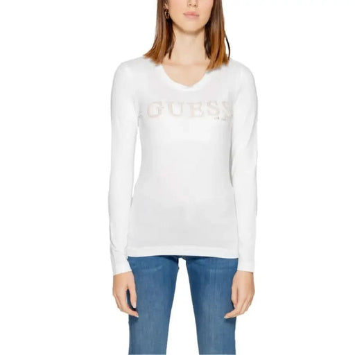 White long-sleeved Guess women’s T-shirt with ’GUESS’ logo across the chest