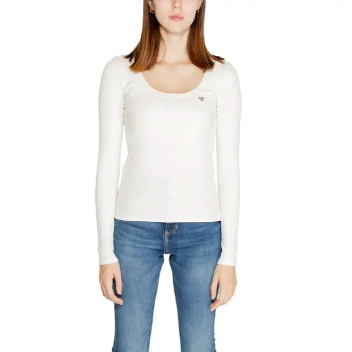 White long-sleeved scoop neck top paired with blue jeans from Guess Active Women T-Shirt