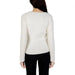 White long-sleeved sweater modelled by a person with long dark hair from Morgan De Toi