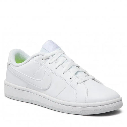 White Nike low-top sneaker featuring lace-up closure for men