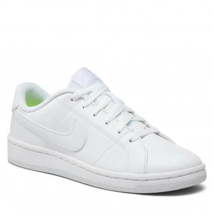 White Nike low-top sneaker featuring lace-up closure for men