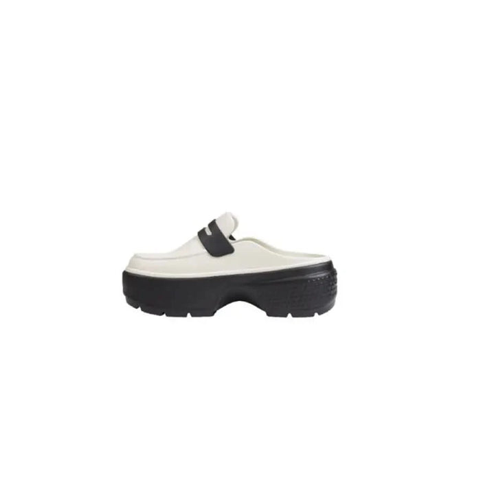 White platform loafer mule from Crocs Women Slippers in synthetic slip-on design