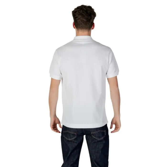 Lacoste White Cotton Polo for Men displayed in a stylish arrangement