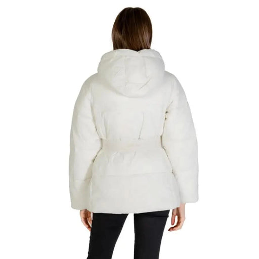 White puffy winter coat with a hood and cinched waist by Calvin Klein for women