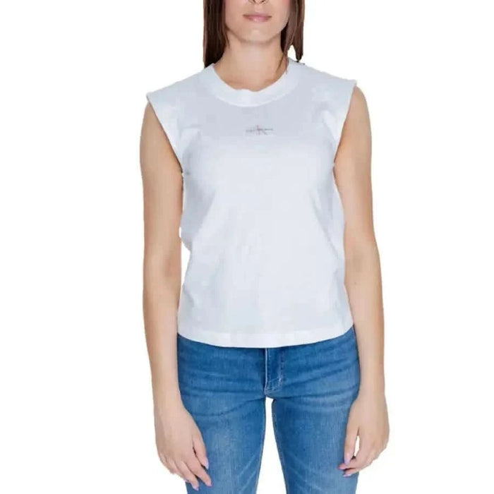 White sleeveless Calvin Klein t-shirt with blue jeans for women