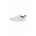 White Tommy Hilfiger Men Sneakers with black heel accent and red detailing