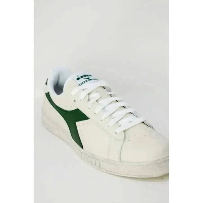 White Diadora Men Sneakers featuring a green side logo and laces for stylish comfort