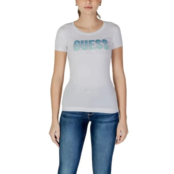 White t-shirt featuring gradient blue GUESS logo print for women’s fashion